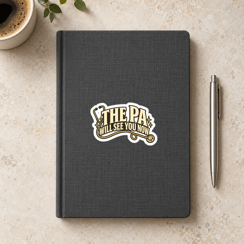 The PA Will See You Now Sticker in the 3 × 3 inch size shown on a charcoal notebook in an illustrative lifestyle mockup