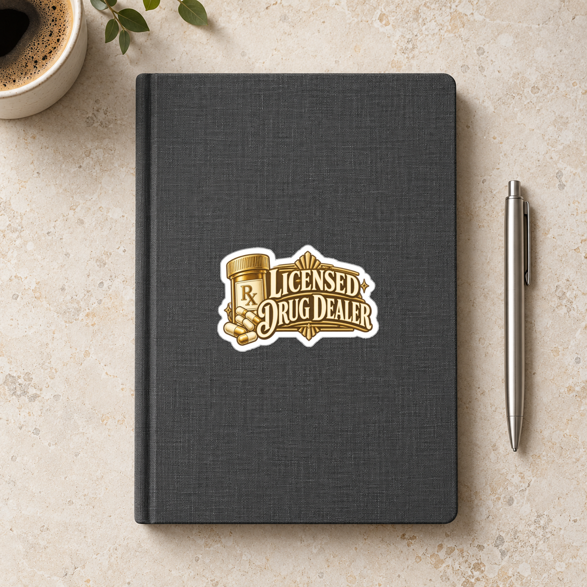 Licensed Drug Dealer Sticker in the 3 × 3 inch size shown on a charcoal notebook in an illustrative lifestyle mockup