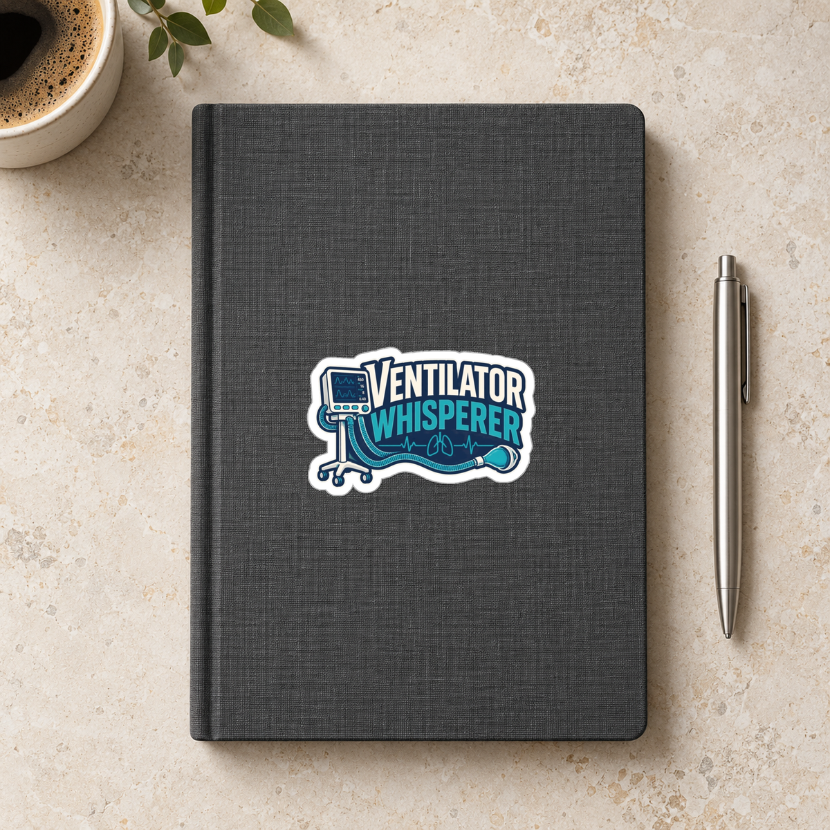 Ventilator Whisperer Sticker in the 3 × 3 inch size shown on a charcoal notebook in an illustrative lifestyle mockup