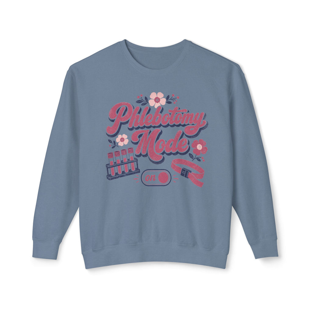 Phlebotomy Mode On Comfort Colors sweatshirt in Blue Jean, front view on white