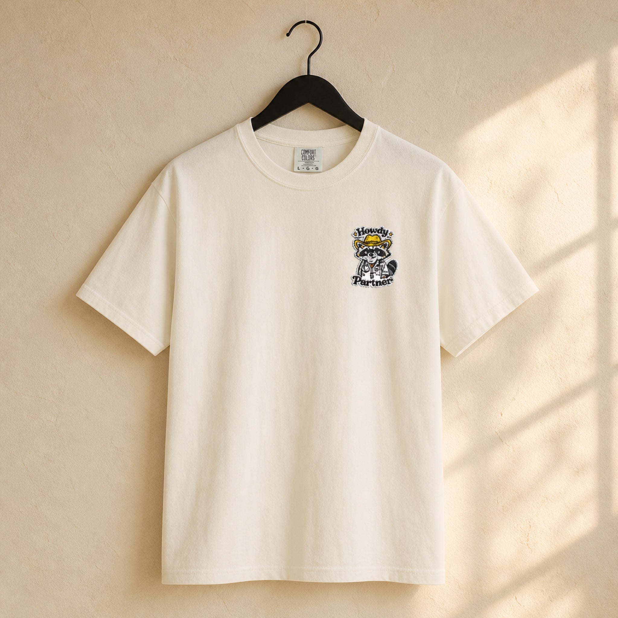 Howdy Partner Raccoon Comfort Colors T-Shirt | Western Medical Tee