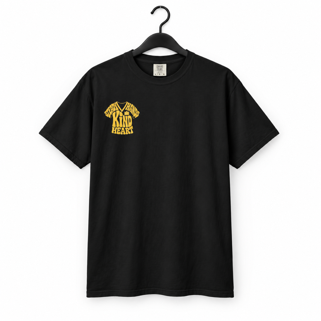 Black Steady Hands Kind Heart nurse tee on a hanger, white background