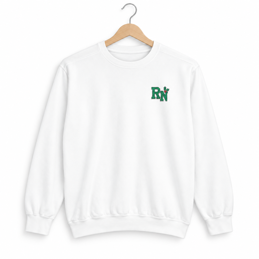 White RN holly embroidered Comfort Colors 1566 sweatshirt on a hanger