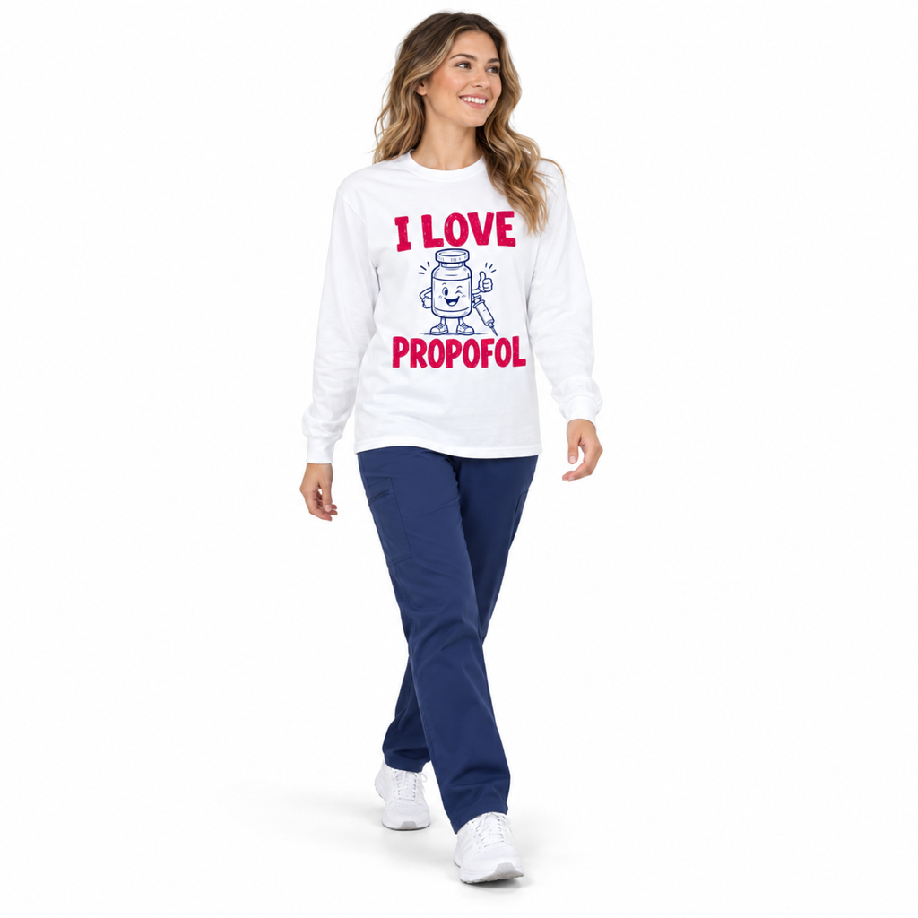 Healthcare professional walking in a white I Love Propofol long-sleeve shirt with scrub pants on a white background