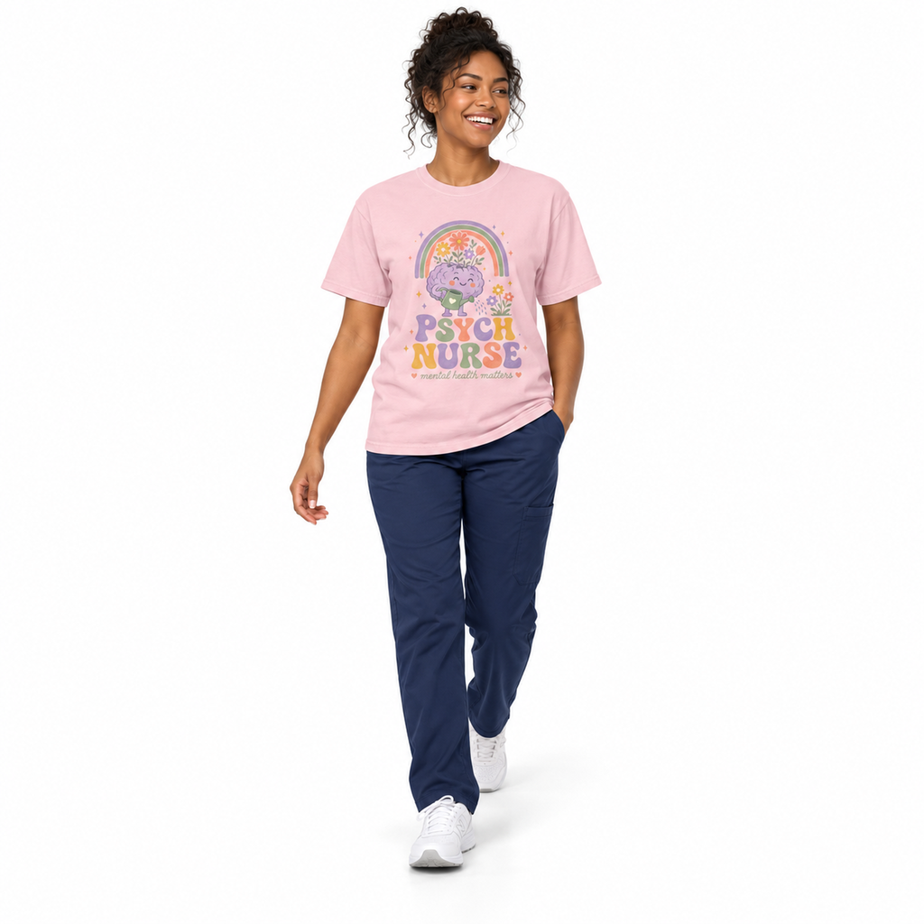 Nurse walking in a Blossom Psych Nurse tee with scrub pants on white