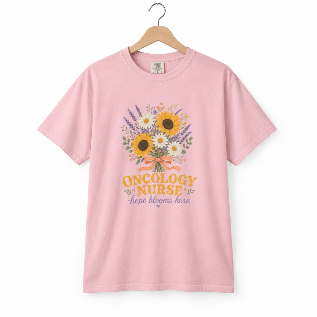 Blossom Oncology Nurse Hope Blooms Here floral tee on a hanger against white