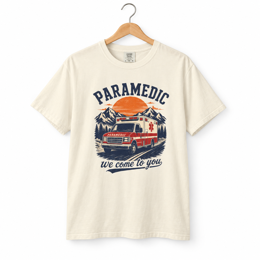 Ivory Paramedic We Come to You tee on a hanger against white