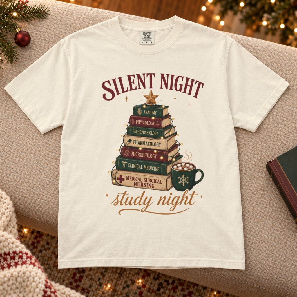 Ivory Silent Night Study Night medical student Christmas tee flat lay on a cozy lounge bench with restrained holiday styling