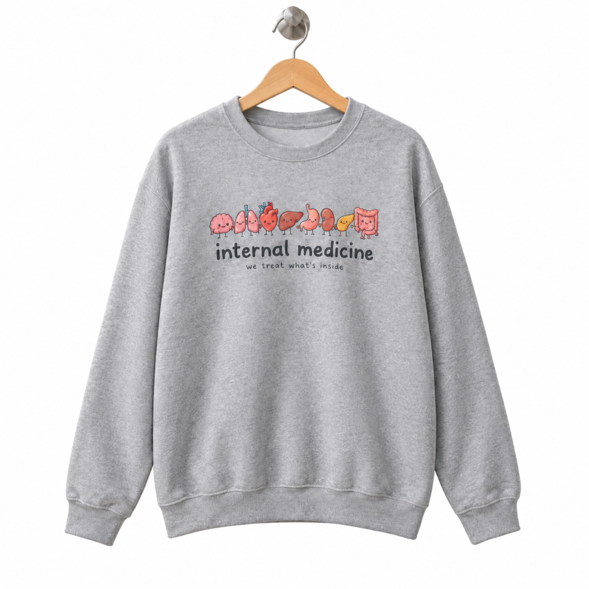 Internal Medicine We Treat What's Inside Sweatshirt on a hanger against a white background
