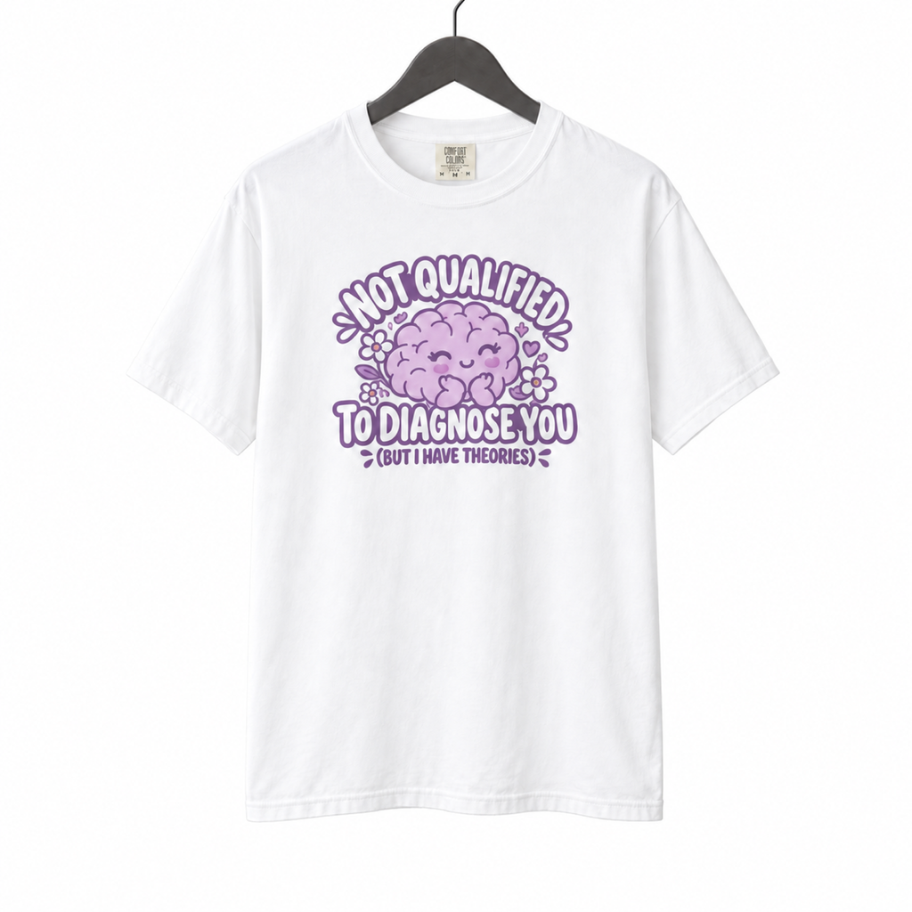 Not Qualified to Diagnose You Shirt on a hanger against a white background