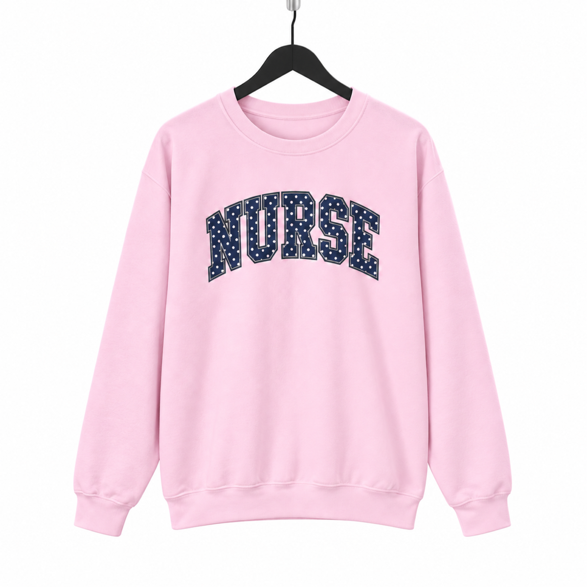 Nurse Polka Dot Varsity sweatshirt on hanger against a pure white background