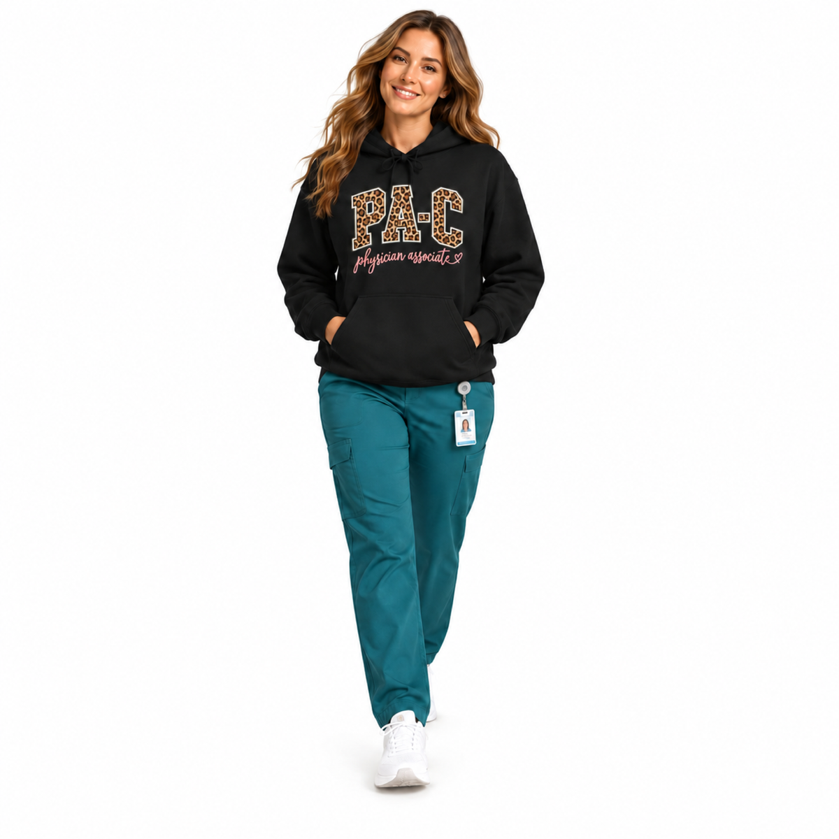 Medical professional walking in PA-C Leopard hoodie and teal scrubs against pure white background