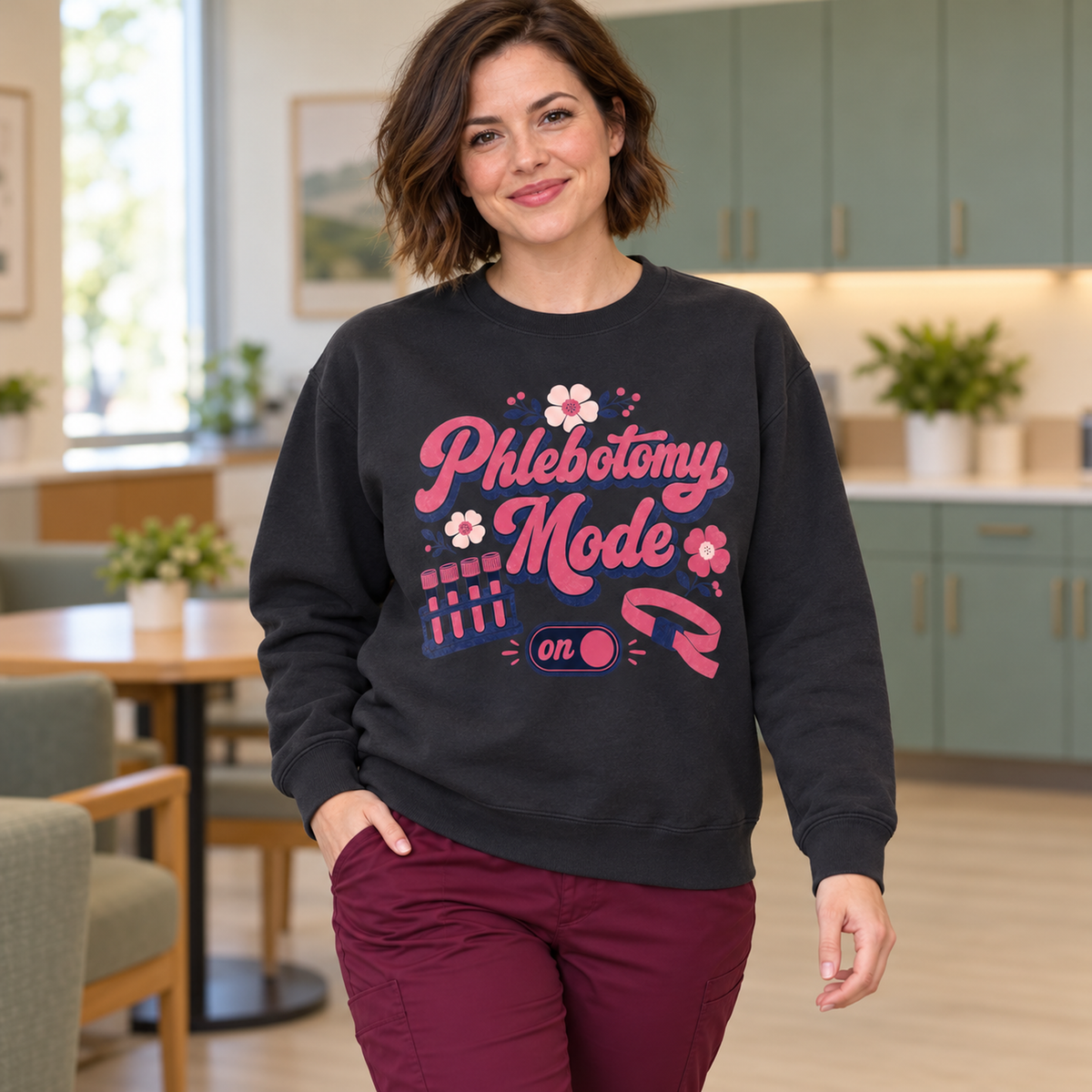 Phlebotomy Mode On Sweatshirt, Comfort Colors Crewneck, Phlebotomist Gift in Black — model in warm medical setting