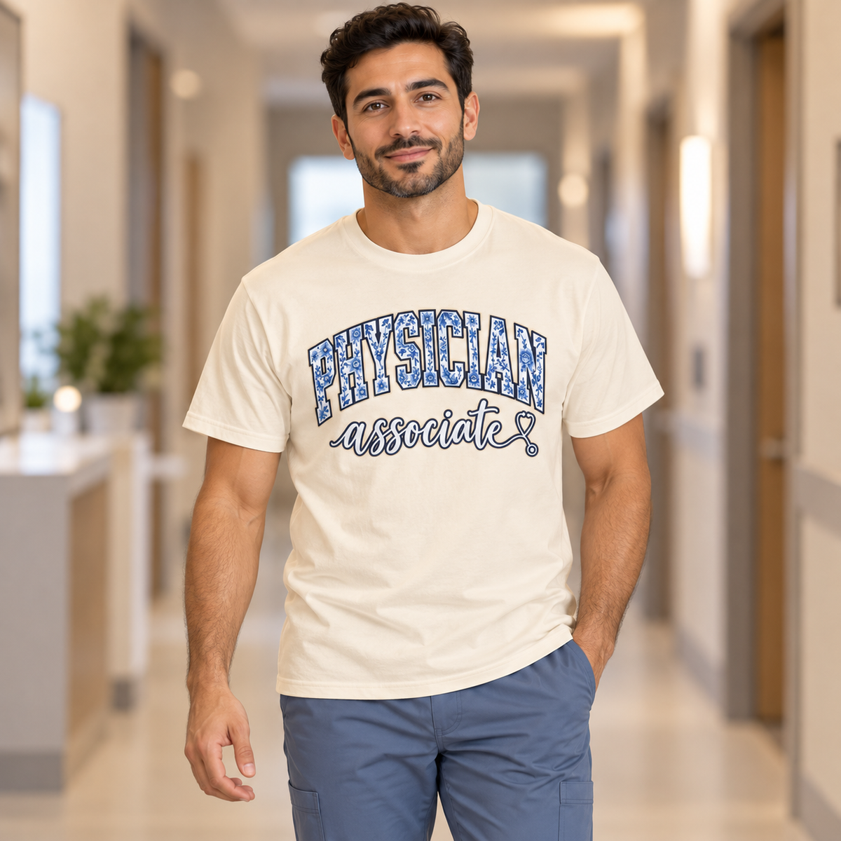 Physician Associate Varsity Shirt in Ivory — model in medical setting