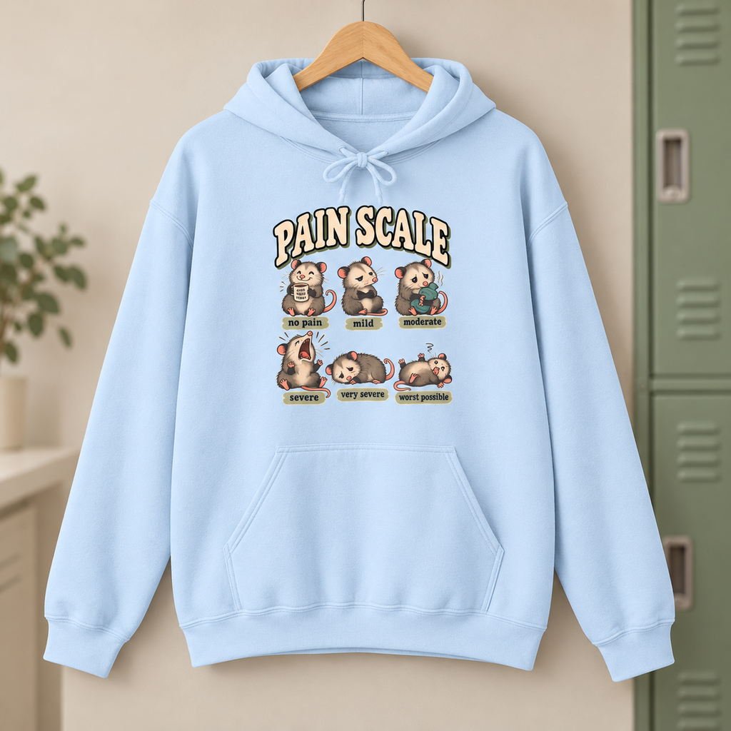Pain Scale Opossum Hoodie in Light Blue — product in warm setting